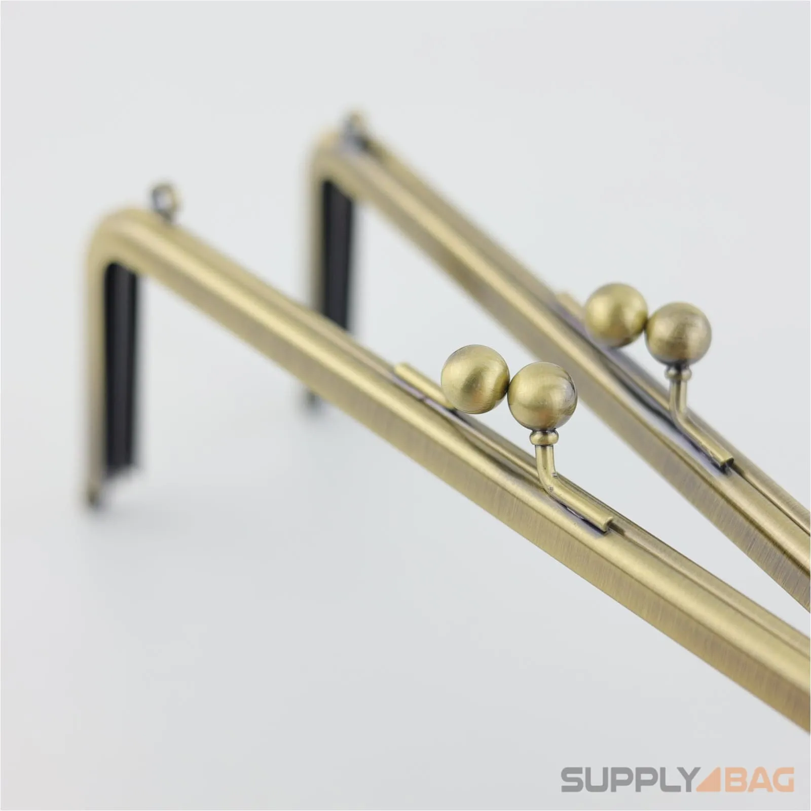 7 x 2 3/4 inch - Kisslock Clasp - Antique Brass Metal Purse Frame with O Rings