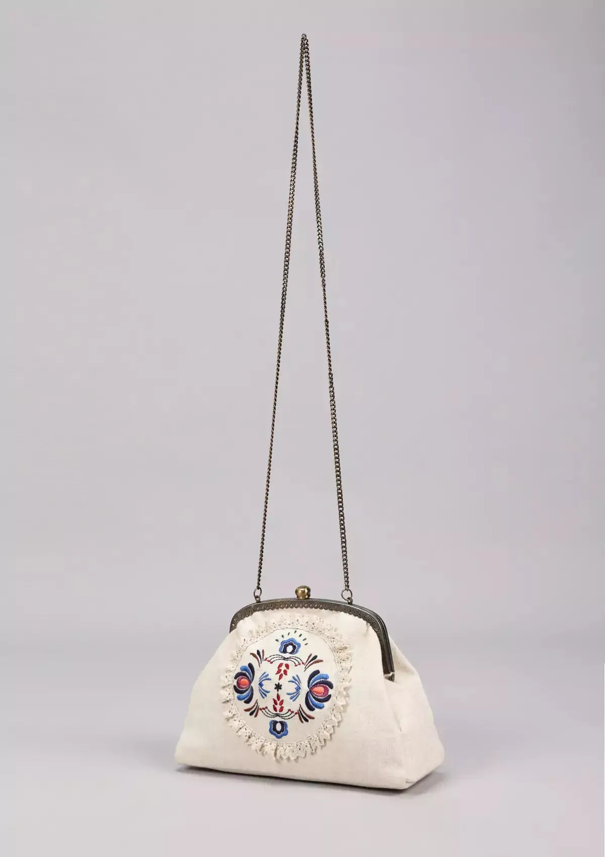 Beige Handheld Clutch and Sling Bag